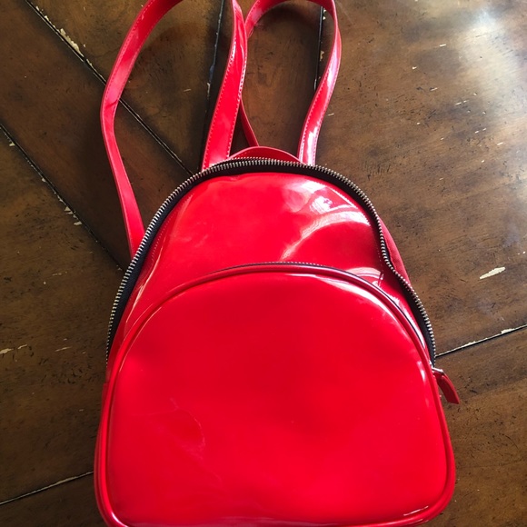 red patent leather backpack